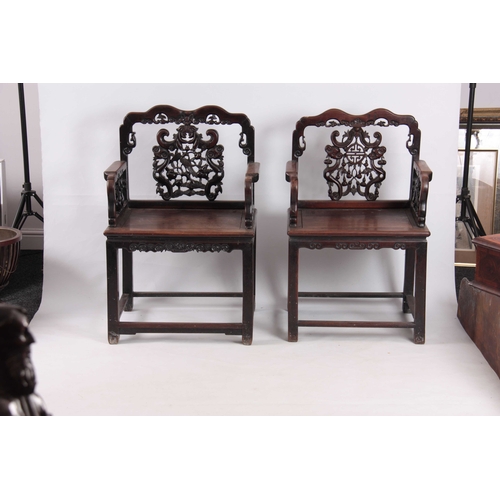 223 - TWO SIMILAR 18TH/ 19TH  CENTURY CHINESE HARDWOOD OPEN ARMCHAIRS each with pierced carved shaped back... 