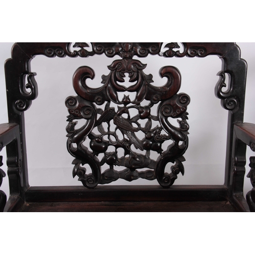 223 - TWO SIMILAR 18TH/ 19TH  CENTURY CHINESE HARDWOOD OPEN ARMCHAIRS each with pierced carved shaped back... 