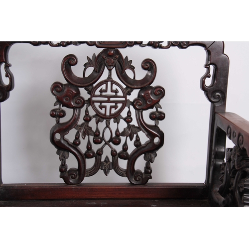 223 - TWO SIMILAR 18TH/ 19TH  CENTURY CHINESE HARDWOOD OPEN ARMCHAIRS each with pierced carved shaped back... 