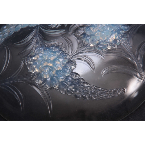 23 - R LALIQUE FRANCE  AN EARLY 20TH CENTURY RELIEF MOULDED OPALESCENT SHALLOW BOWL 'VERONIQUE' with flow... 