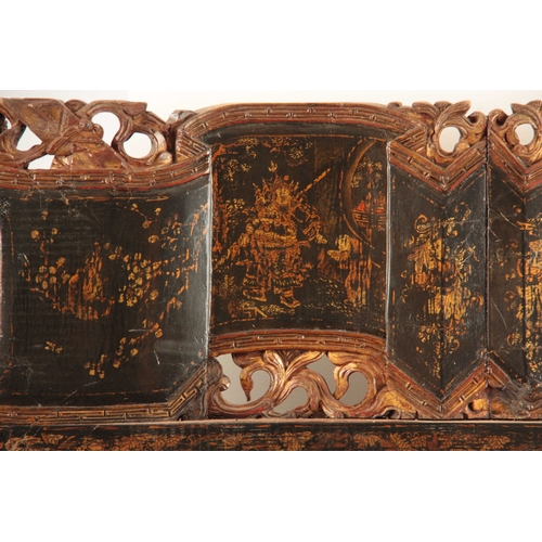 235 - A LARGE 19th CENTURY LACQUERED CHINOISERIE MIRROR having a scrolled frieze with pierced gilt leaf wo... 