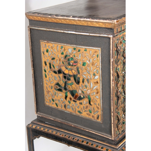 237 - AN UNUSUAL DECORATIVE INDIAN CABINET ON STAND with coloured cut glass pieces depicting figures among... 