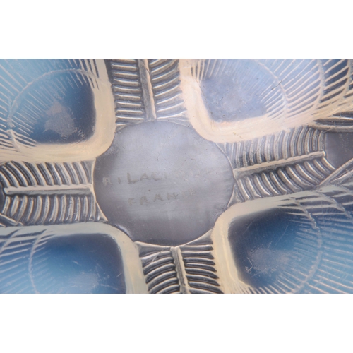 24 - R. LALIQUE FRANCE A 20TH CENTURY LARGE RELIEF MOULDED OPALESCENT GLASS BOWL 'COCQUILLES' of deep-sid... 