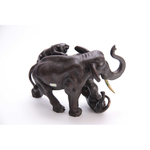 242 - A 19TH CENTURY JAPANESE BRONZE depicting an Elephant and two Tigers, fitted with ivory tusks - signe... 