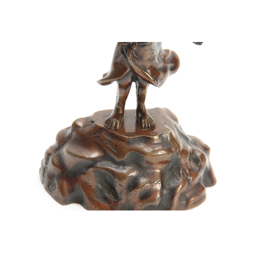 249 - A JAPANESE MEIJI PERIOD BRONZE FIGURAL CENSER standing on a naturalistic base 30.5cm high.