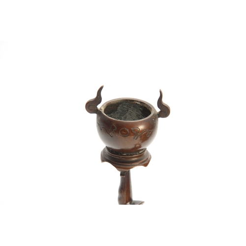 249 - A JAPANESE MEIJI PERIOD BRONZE FIGURAL CENSER standing on a naturalistic base 30.5cm high.