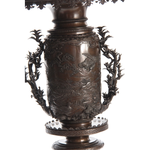 251 - A LARGE AND IMPRESSIVE PAIR OF MEIJI PERIOD JAPANESE BRONZE VASES with sconce style rims decorated w... 