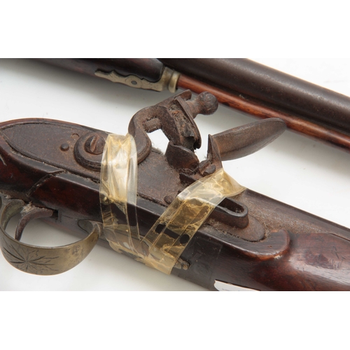 276 - A 19th CENTURY EASTERN DOUBLE BARREL PERCUSION PISTOL on a walnut stock with chequered pique work gr... 