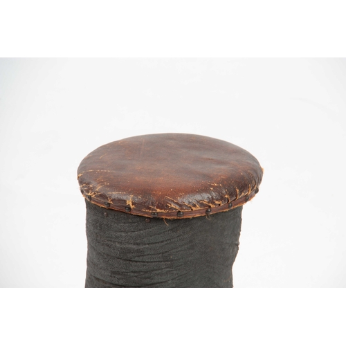 304 - AN EARLY 20th CENTURY TAXIDERMY STOOL formed from an elephants foot 41cm high