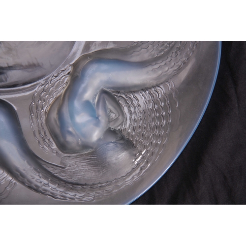 31 - R. LALIQUE, FRANCE A 20TH CENTURY OPALESCENT GLASS CALYPSO CHARGER under decorated with five swimmin... 