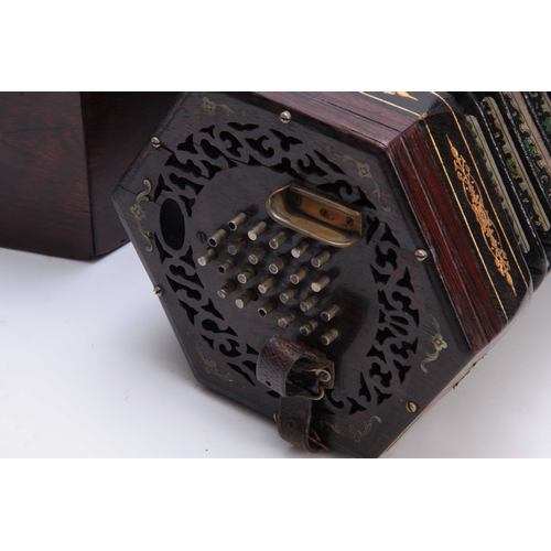 320 - A LATE 19th CENTURY CONCERTINA POSSIBLY BY WHEATSTONE having pierced rosewood ends inlaid with nicke... 