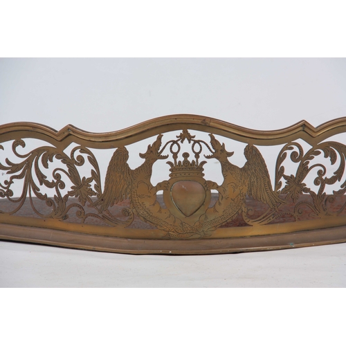 330 - A GEORGE III COUNTRY HOUSE SERPENTINE FRONT BRASS HEARTH FENDER with arched shaped gallery centred b... 