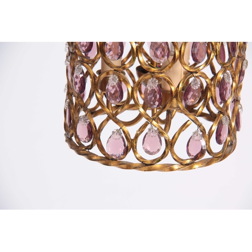 349 - A 20TH CENTURY CIRCULAR HANGING GILT BRASS HALL LANTERN with twisted frame enclosing pale purple gla... 