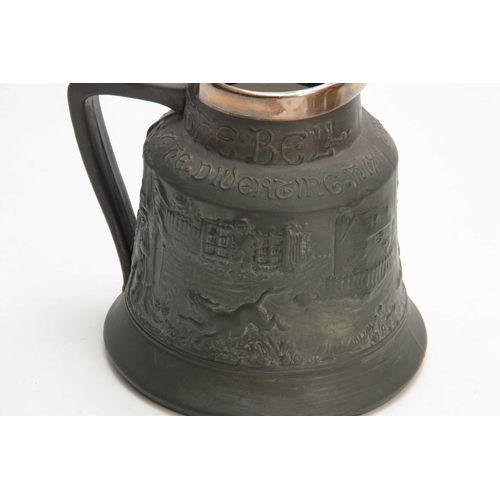 56 - A LATE 19TH CENTURY MACINTYRE BURSLEM BELL-SHAPED SHOULDERED JUG WITH SILVER RIM the dark olive gree... 