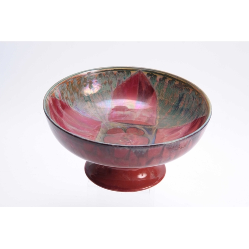 66 - A PILKINGTON'S ROYAL LANCASTRIAN FOOTED BOWL BY GLADYS ROGERS having a red and green glaze with a ye... 