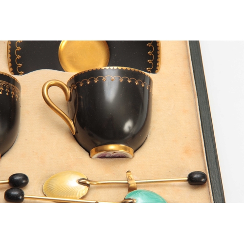 89 - AN EARLY 20TH CENTURY ROYAL WORCESTER CASED COFFEE CUP AND SAUCER SET with black ground and gilt dec... 