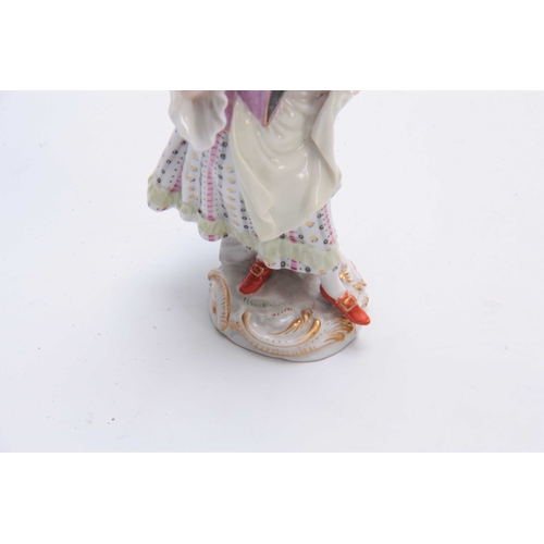 93 - A 19TH CENTURY MEISSEN STATUE OF A YOUNG LADY reading a book decorated in brightly painted dress - s... 