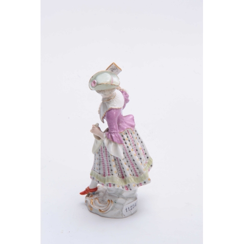 93 - A 19TH CENTURY MEISSEN STATUE OF A YOUNG LADY reading a book decorated in brightly painted dress - s... 