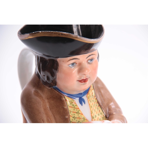 95 - A LATE 19THCENTURY HARD PORCELAIN TOBY JUG the well dressed seated figure wearing a brown coat and t... 