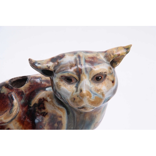 97 - A 19TH CENTURY TREAKLE GLAZED SLIPWARE CAT 19cm high.