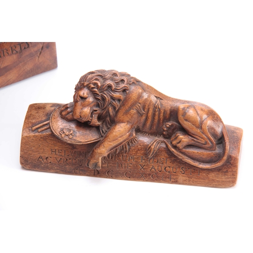 359 - A 19TH CENTURY SWISS BLACK FOREST WALNUT WALL PLAQUE depicting the lion Luzern 22cm wide 16cm high A... 