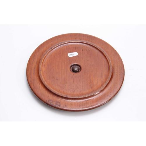 361 - A 19TH CENTURY CARVED OAK CIRCULAR INK STAND with cut glass inkwell to the centre having a floral ca... 