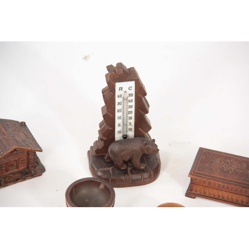 364 - A CARVED BLACK FOREST THERMOMETER with tree and bear motif to the front 15cm high - marked GENEVE, A... 