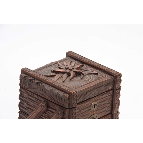 368 - A SWISS CARVED BLACK FOREST JEWELLERY BOX titled GRINDELWALD with lined double hinged back drawers 1... 