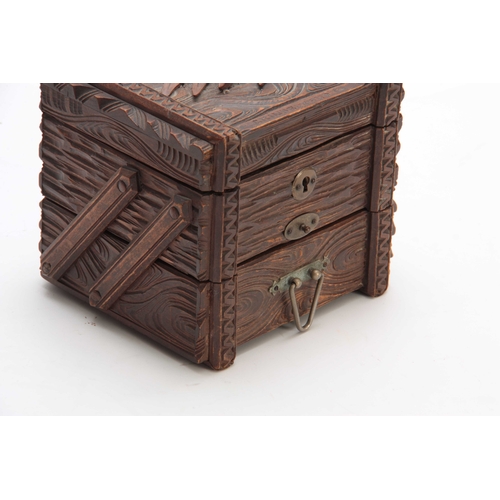 368 - A SWISS CARVED BLACK FOREST JEWELLERY BOX titled GRINDELWALD with lined double hinged back drawers 1... 