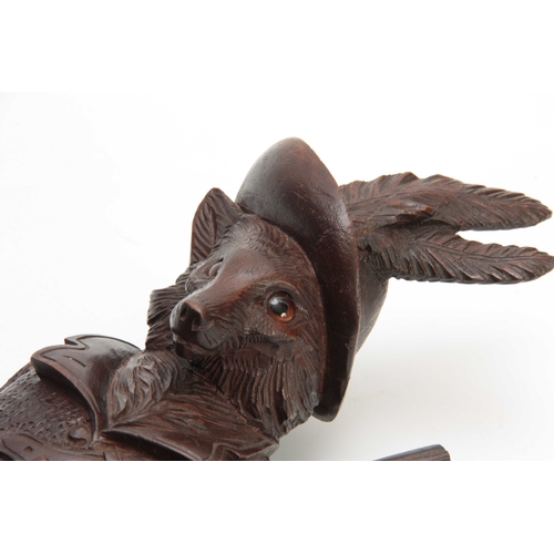 380 - A LARGE LATE 19th CENTURY MUSICAL CARVED BLACK FOREST COAT HOOK modelled as a well-dressed fox with ... 