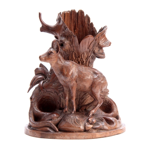 386 - A LATE 19TH CENTURY SWISS BLACK FOREST CARVED LINDENWOOD ONE PIECE VASE depicting a mountain goat ne... 