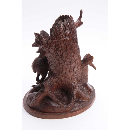 386 - A LATE 19TH CENTURY SWISS BLACK FOREST CARVED LINDENWOOD ONE PIECE VASE depicting a mountain goat ne... 