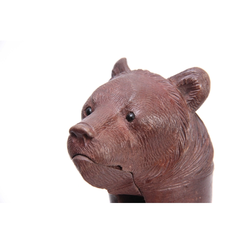 388 - A LATE 19TH CENTURY SWISS BLACK FOREST NUTCRACKER formed as a bears head 18cm overall.