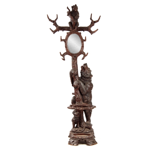 397 - AN IMPRESSIVE  LATE 19TH CENTURY SWISS BLACK FOREST STICK AND COAT STAND depicting a large bear clim... 