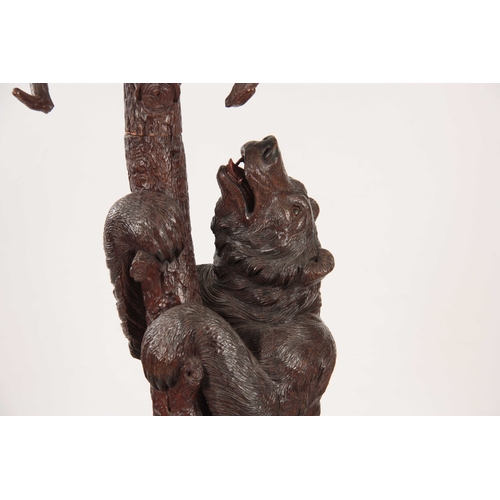 397 - AN IMPRESSIVE  LATE 19TH CENTURY SWISS BLACK FOREST STICK AND COAT STAND depicting a large bear clim... 