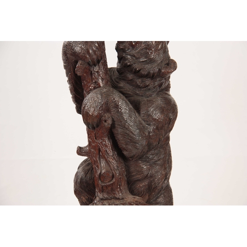 397 - AN IMPRESSIVE  LATE 19TH CENTURY SWISS BLACK FOREST STICK AND COAT STAND depicting a large bear clim... 