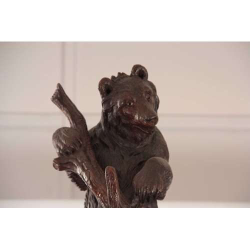 397 - AN IMPRESSIVE  LATE 19TH CENTURY SWISS BLACK FOREST STICK AND COAT STAND depicting a large bear clim... 