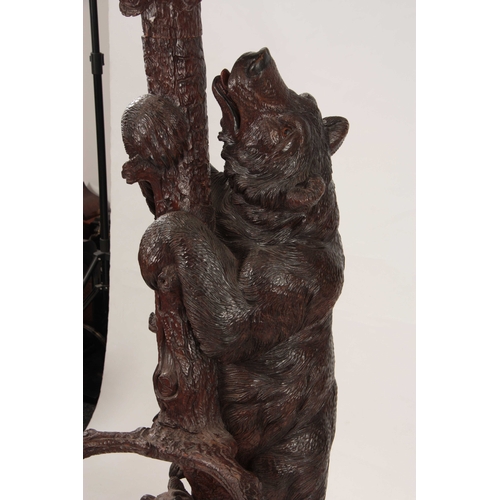 397 - AN IMPRESSIVE  LATE 19TH CENTURY SWISS BLACK FOREST STICK AND COAT STAND depicting a large bear clim... 