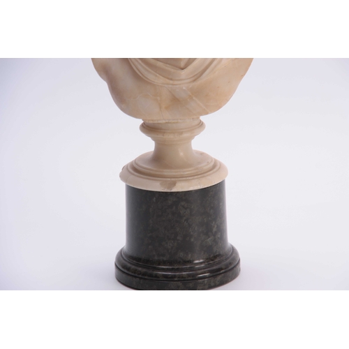 399 - A ROMAN MARBLE BUST finely carved, mounted on a marble socle base  38cm high.