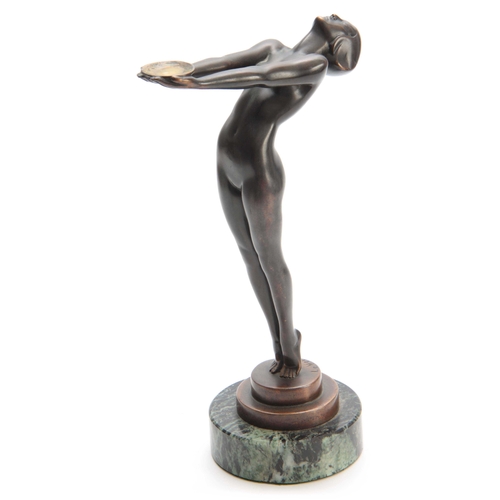 421 - LE VERRIER. A FRENCH ART DECO PATINATED BRONZE SCULPTURE modelled as a nude dancer mounted on a circ... 