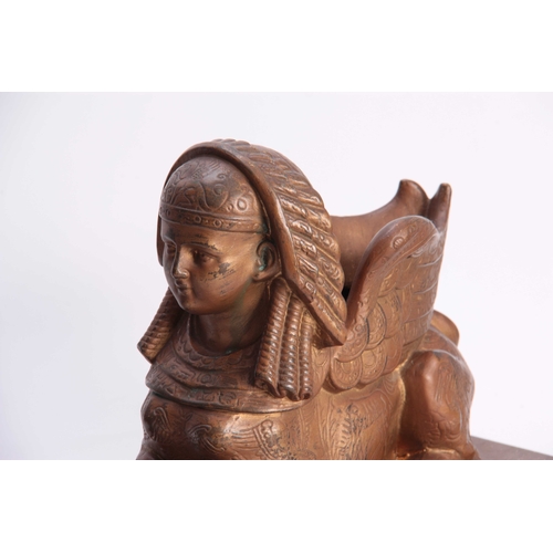 436 - A PAIR OF BRONZED SPHINX ON PLINTH BASES, 39.5cm long, 21cm wide.