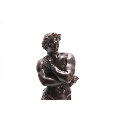 438 - A LATE 19th CENTURY PATINATED BRONZE FIGURE modelled as a semi-nude gladiator mounted on a black mar... 