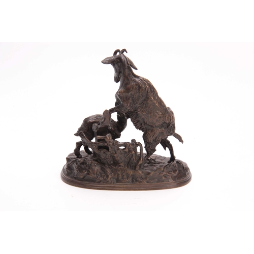 439 - PIERRE-JULES MENE A LATE 19th CENTURY FRENCH PATINATED BRONZE GROUP modelled as a nanny goat with he... 