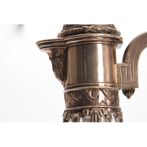 440 - A FABERGE TALL CUT GLASS CLARET JUG the oval elongated body with star-cut panels on a circular foot ... 