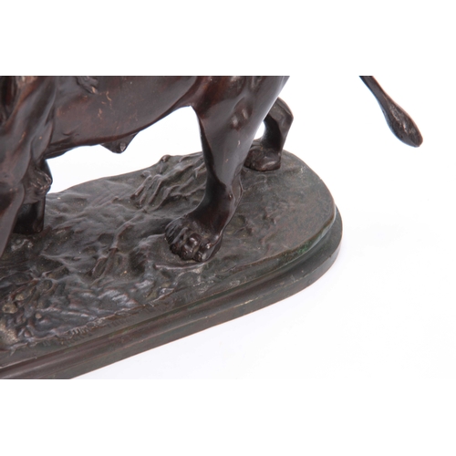 464 - A LATE 19TH CENTURY BRONZE SCULPTURE OF A LION mounted on a naturalistic base 30cm wide 21.5cm high.