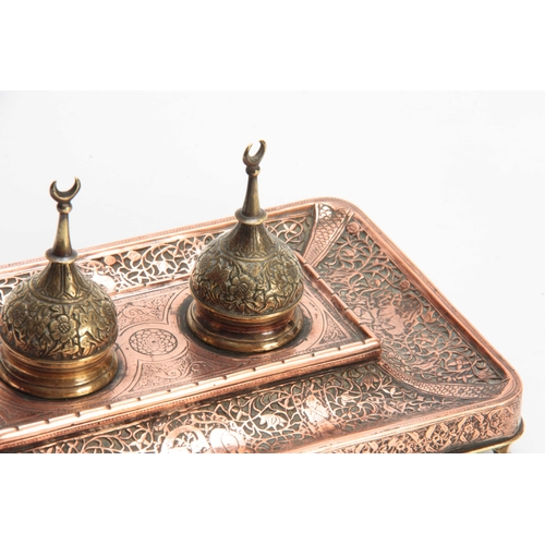 472 - A 19TH CENTURY COPPER AND BRASS PERSIAN STYLE INK STAND with dome-shaped lids and Turkish moons moun... 