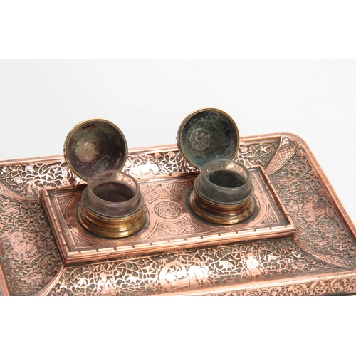 472 - A 19TH CENTURY COPPER AND BRASS PERSIAN STYLE INK STAND with dome-shaped lids and Turkish moons moun... 