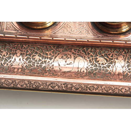 472 - A 19TH CENTURY COPPER AND BRASS PERSIAN STYLE INK STAND with dome-shaped lids and Turkish moons moun... 