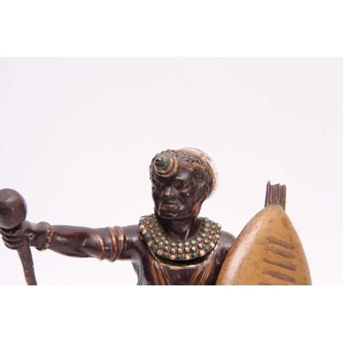 484 - A LATE 19th CENTURY COLD PAINTED FIGURAL INKWELL modelled as an African warrior with hinged head rev... 