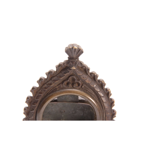 492 - A 19TH CENTURY GOTHIC STYLE BRONZE POCKET WATCH HOLDER depicting a guardsman on a stepped plinth 21c... 